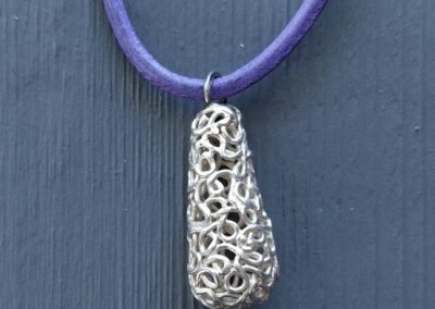 Pendentif en argent 999, avec cordon violet