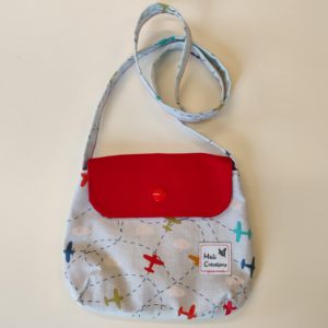 Sac enfant motif avion et rabat rouge