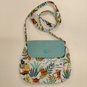 Sac enfant motif trésor et rabat turquoise