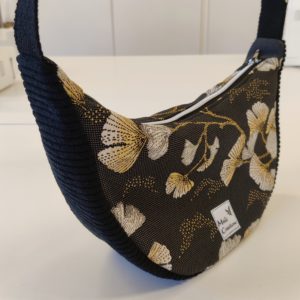 Sac demi-lune en jacquard noir avec feuille de ginko